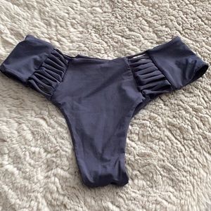 Strange bikini bottoms EUC